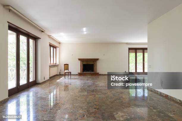 Large Living Room With White Walls And Marble Floor Interior Vintage Abandoned Villa Ready To Be Demolished Stock Photo - Download Image Now
