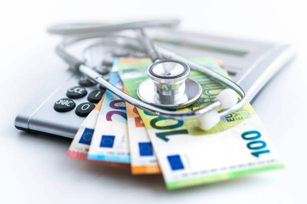 健康保険  - currency stethoscope healthcare and medicine savings ストックフォトと画像