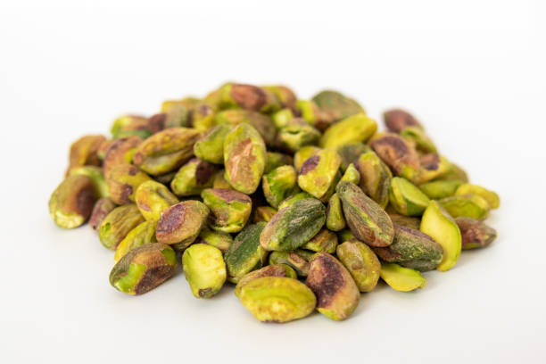 istock Lots of Peeled roasted pistachio nuts 1428405292