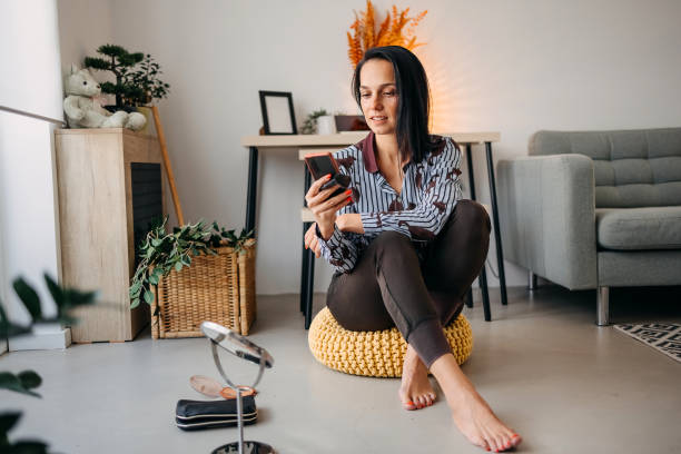 istock Woman is texting on the phone 1428406902