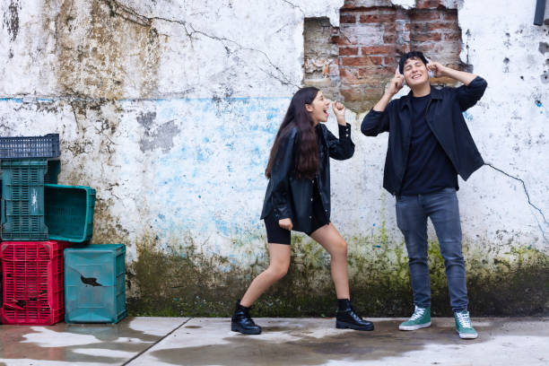 istock Young Latinos singing together 1428409288