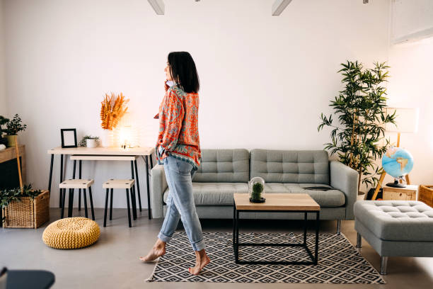 istock Woman using smartphone at home 1428410040