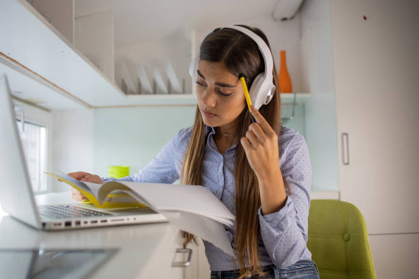 istock Young woman working from home 1428412331