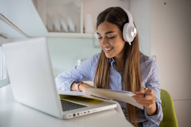 istock Young woman working from home 1428412347