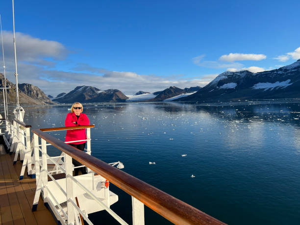 istock posing in front of glacier 1428416166