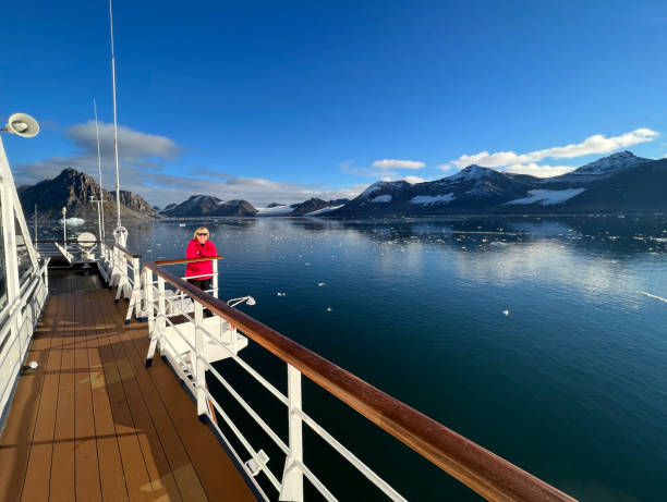 istock posing in front of glacier 1428416298