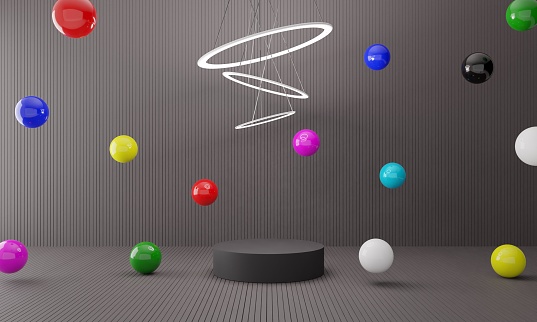 black podium with colorful balls in the black room.3d rendering.