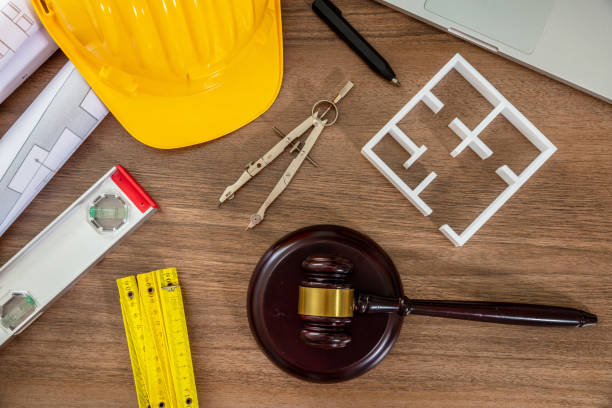 istock Construction and Labor law flat lay. Judge gavel and design tools on table 1428418606