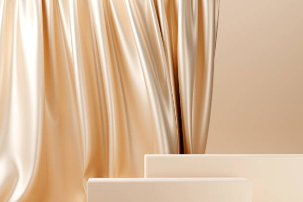 istock Beige pastel podium with beige flying fabric, cloth background 1428422019