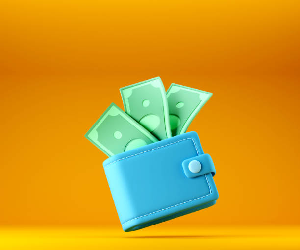 istock Blue wallet with cash dollar bills on yellow background 1428422028