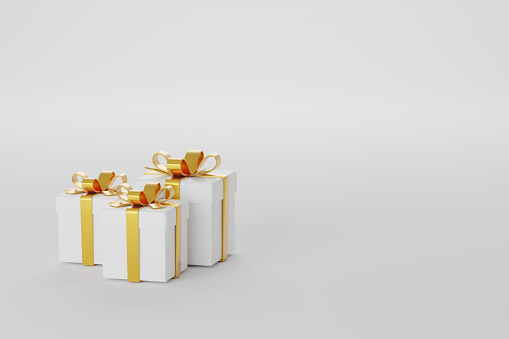 3D Rendering Gift boxes on white background with copy space. Group of white gift boxes with golden bow and ribbon. Gift box reward, celebration, and decoration concept