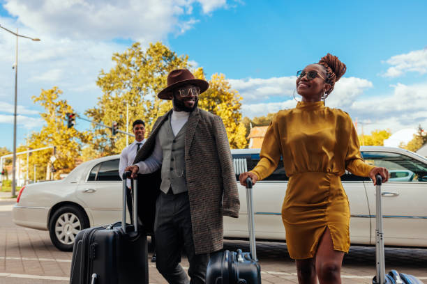 istock Stylish couple arrive at resort. 1428423865