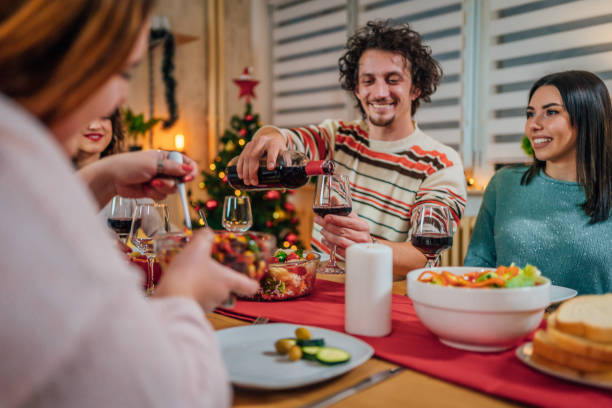 istock Friends having Christmas dinner 1428426296