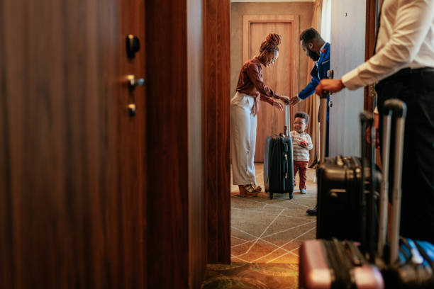 istock Family arrive to hotel room. 1428428253