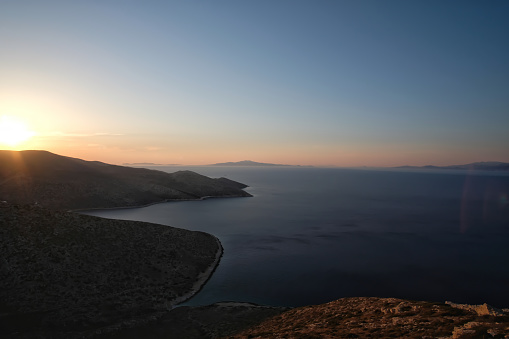 Beautiful sunset at view of the Aegean Sea in Ios Greece