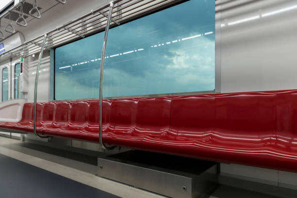 istock Empty seats commuter with Red color interior inside in the subway train. Subway  with empty seats. Inside of a train carriage 1428428995
