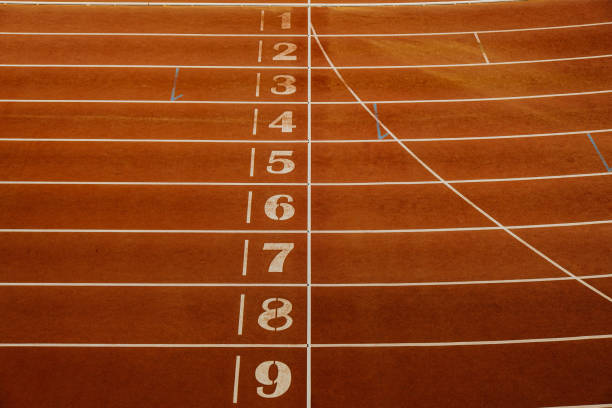 istock finish line on track runner stadium top view 1428431013