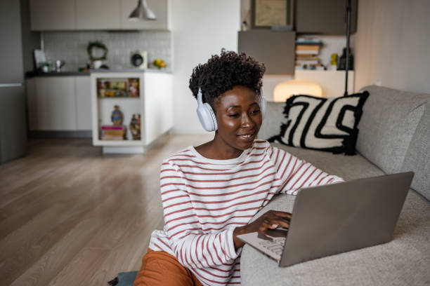 istock African American young woman using laptop 1428440260