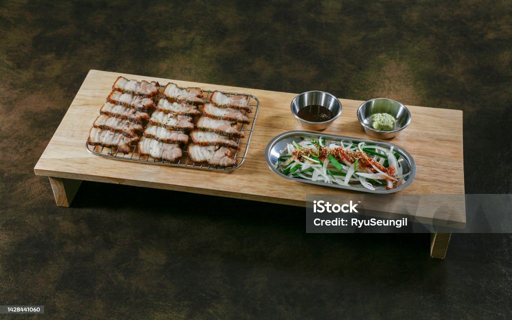 Food Pork belly barbecue set on dark background. Barbecue - Meal Stock Photo