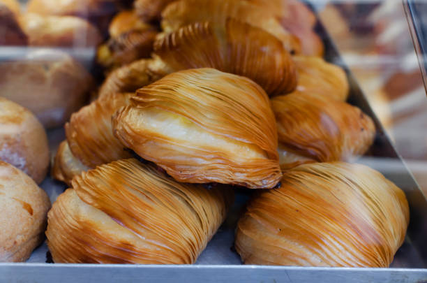 sfogliatella is a traditional Italian dessert. Shell-shaped pastry with ricotta cream. The concept of Italian food. stock photo