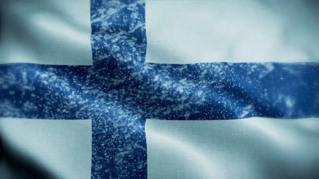 4K blizzard / snow over Finland flag stock video. Frosty Finnish flag. Whirling / swirling ice crystals. Snowflakes flitting over Finland flag.