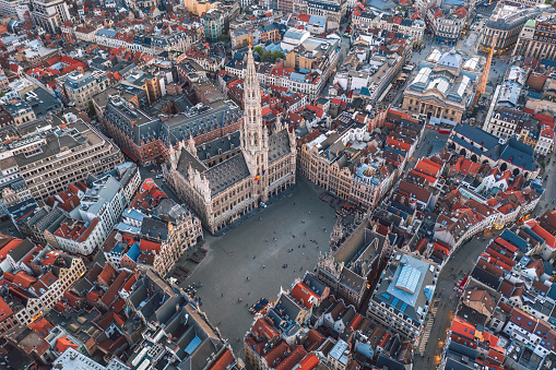 Aerial view of Grand Place square and Town Hall (Hôtel de Ville de Bruxelles). Sunset cityscape of the City of Brussels, Belgium