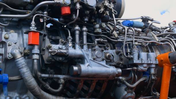istock Helicopter turbojet engine for propeller blades. The turbojet engine is disassembled for technical inspection and repair of the fuel and lubrication system of the hydraulic pipeline. Mechanism concept 1428454238