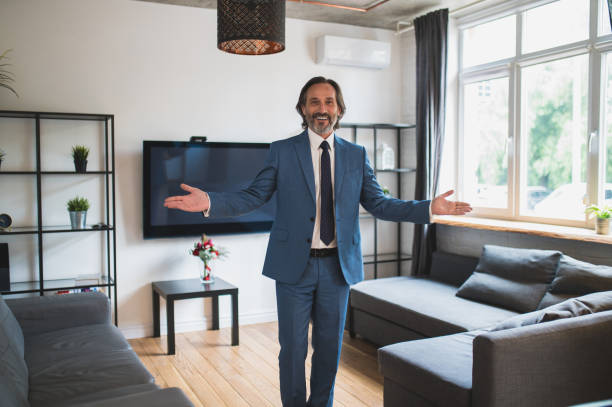 istock Elegant real estate agent presenting apartment for rent 1428463360