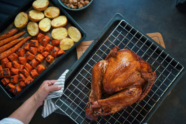 istock Preparing Turkey for Holiday Dinner 1428470715