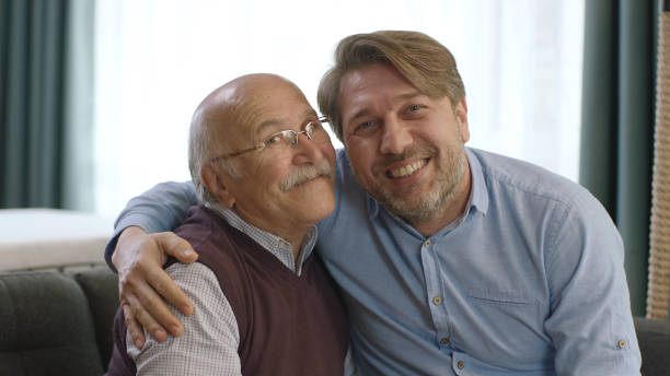 istock The young man is visiting his elderly father on a special day. 1428481052