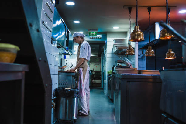 istock Junior chef preparing food ingredients for Chefs final touch 1428483878