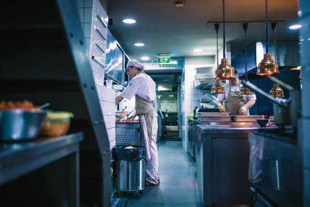 istock Junior chef preparing food ingredients for Chefs final touch 1428483923