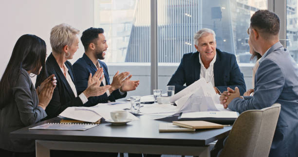 istock Applause, meeting and corporate team celebrating success while clapping hands for target, growth and goal in office boardroom. Support, teamwork and motivation for leadership and innovation 1428484173