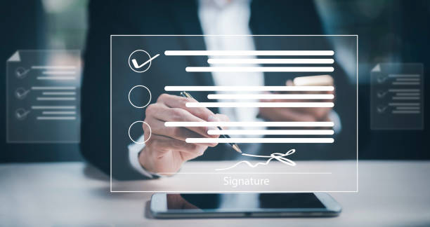 istock Signing electronic documents on digital documents Online, businessman with contract Electronic signature, e-signing, digital document management, paperless office, signing business contract concept, 1428485439