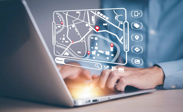 istock Man using laptop with virtual world and model map with location point , GPS app, icon Travel maps and find places in the online system, all screen graphics are generated,Searching for travel. 1428485564