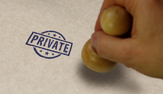Private stamp and stamping hand. Privacy, secret and confidential concept.