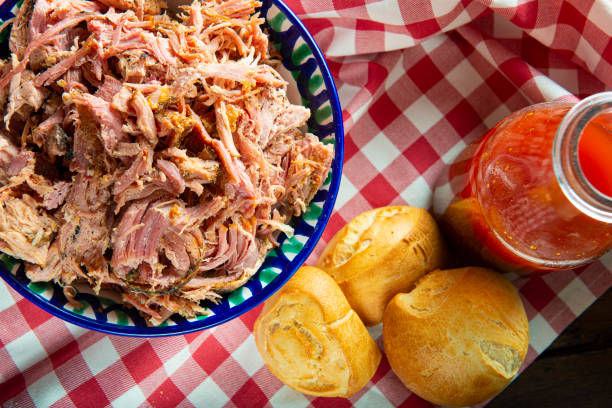 Pulled pork with vinegar barbecue sauce stock photo