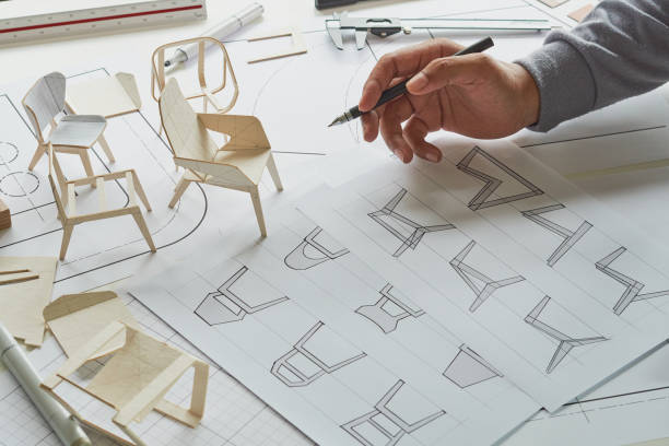 istock Designer sketching drawing design development product plan draft chair armchair Wingback Interior furniture prototype manufacturing production. designer studio concept . 1428504782
