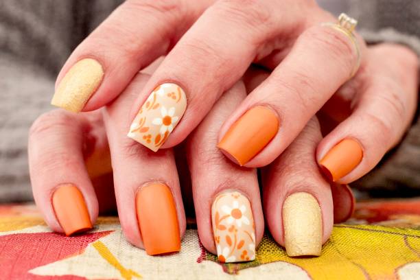 Floral Autumn Halloween Nail Art Design Halloween Inspired Art yellow nail polish stock pictures, royalty-free photos & images