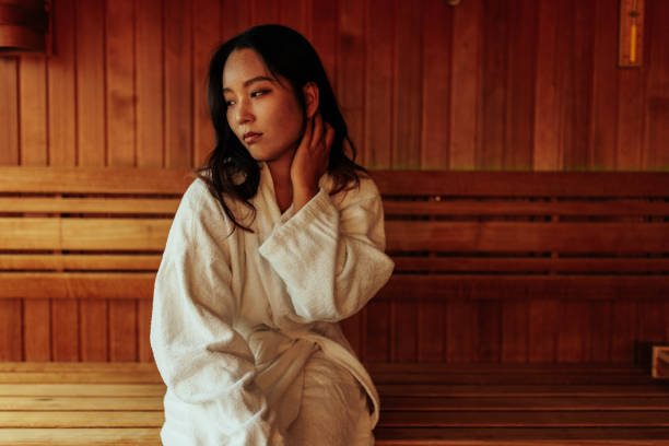 istock Young Asian woman in sauna. 1428509352
