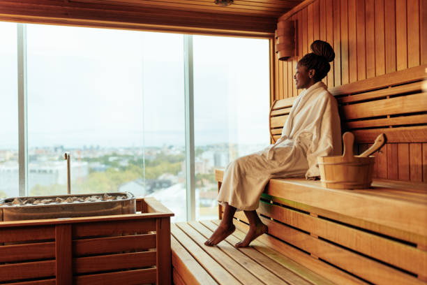 istock Young woman relaxing in sauna. 1428515594