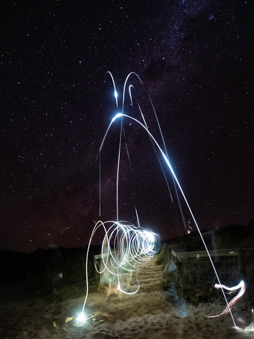 Light painting on a starry night