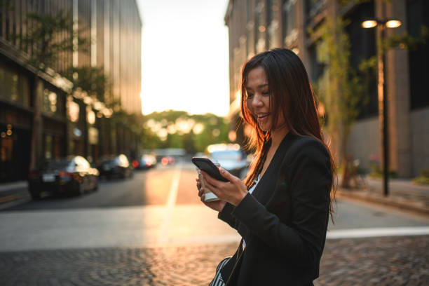 istock Good Looking Asian Female Walking In The City After Work 1428526953