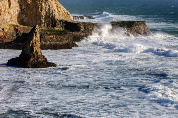 istock Ocean Waves Crashing on Rocky California Coast Beach 1428527579