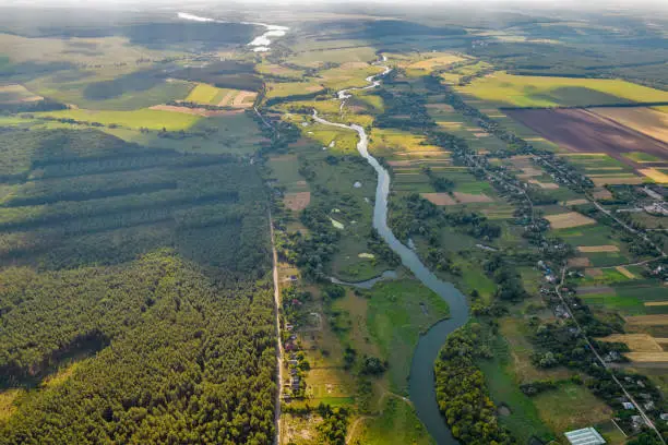Drone aerial view over summer river Ros landscape, Ukraine.