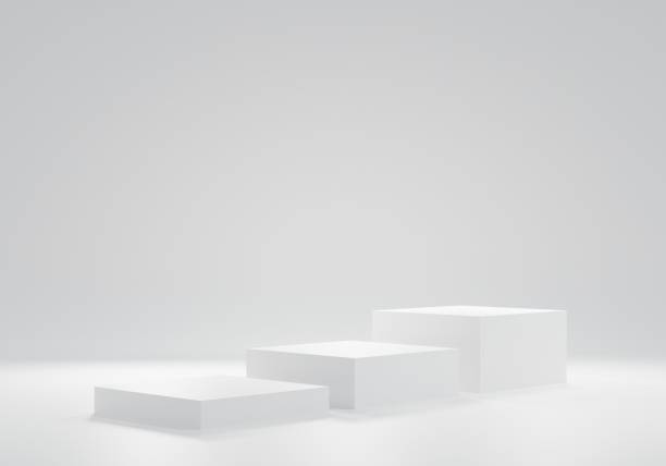 istock 3d illustration Three white square podiums and abstract background. 1428541862