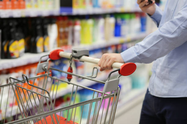 istock shopping in supermarket.(washing powder,detergent,shampoo, soap) 1428545890