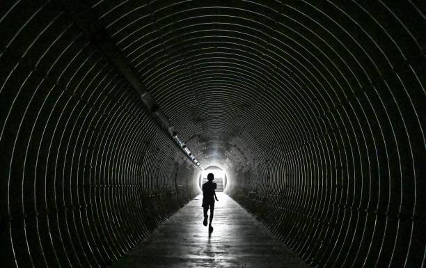 istock Light at end of the tunnel 1428551962