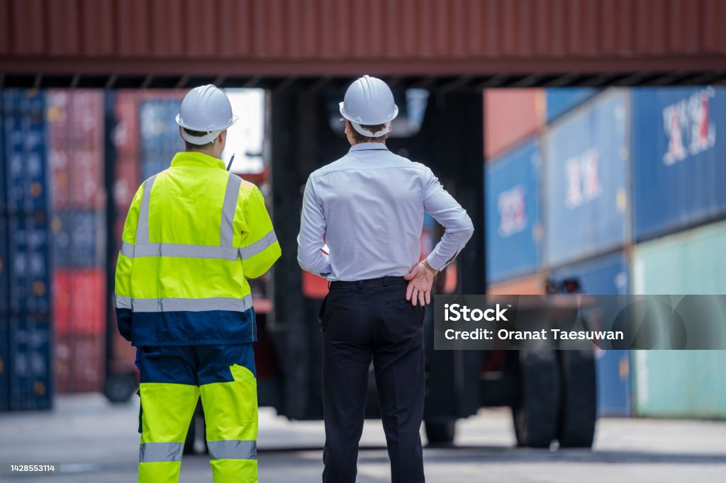 Engineer Container Cargo With Worker Checking Stock Into Container For ...