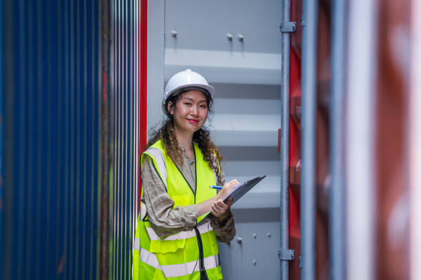 istock Technicians working in the container yard warehouse,Container yard warehouse inspection. 1428553141
